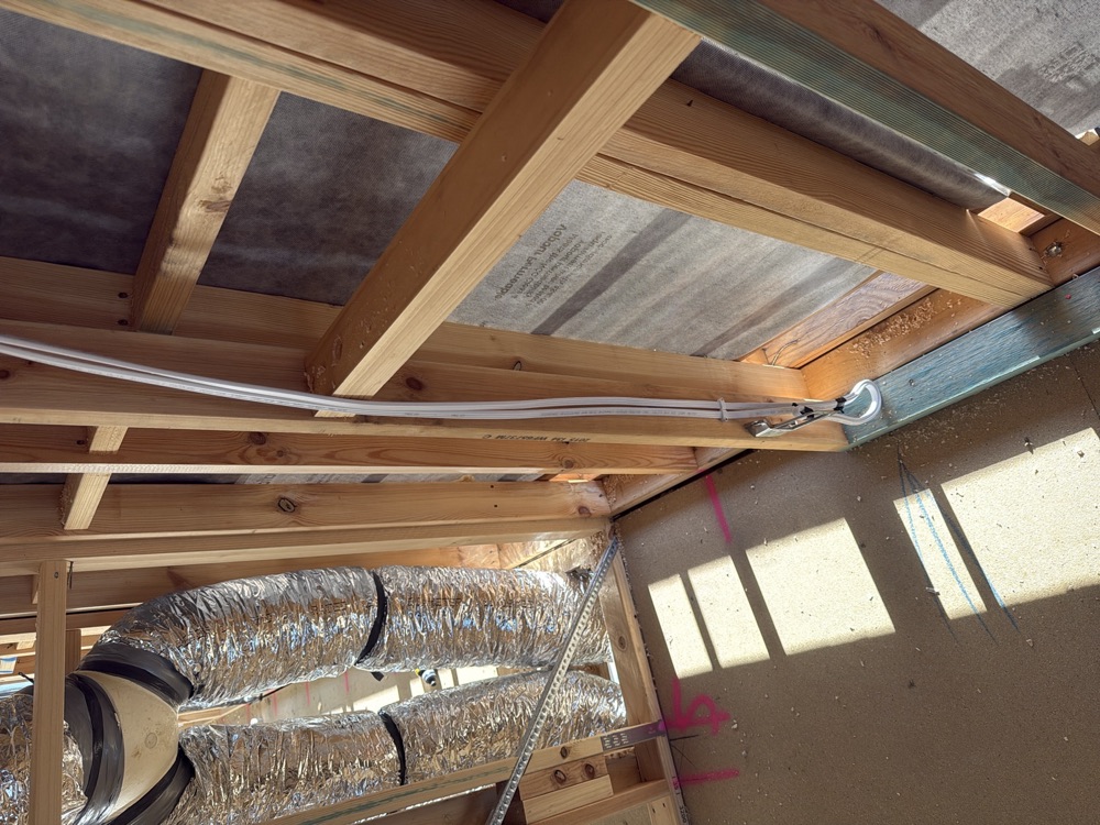 Electrical cable run outside the framing, recorded on a lock-up inspection in Officer, 10 km from Pakenham East