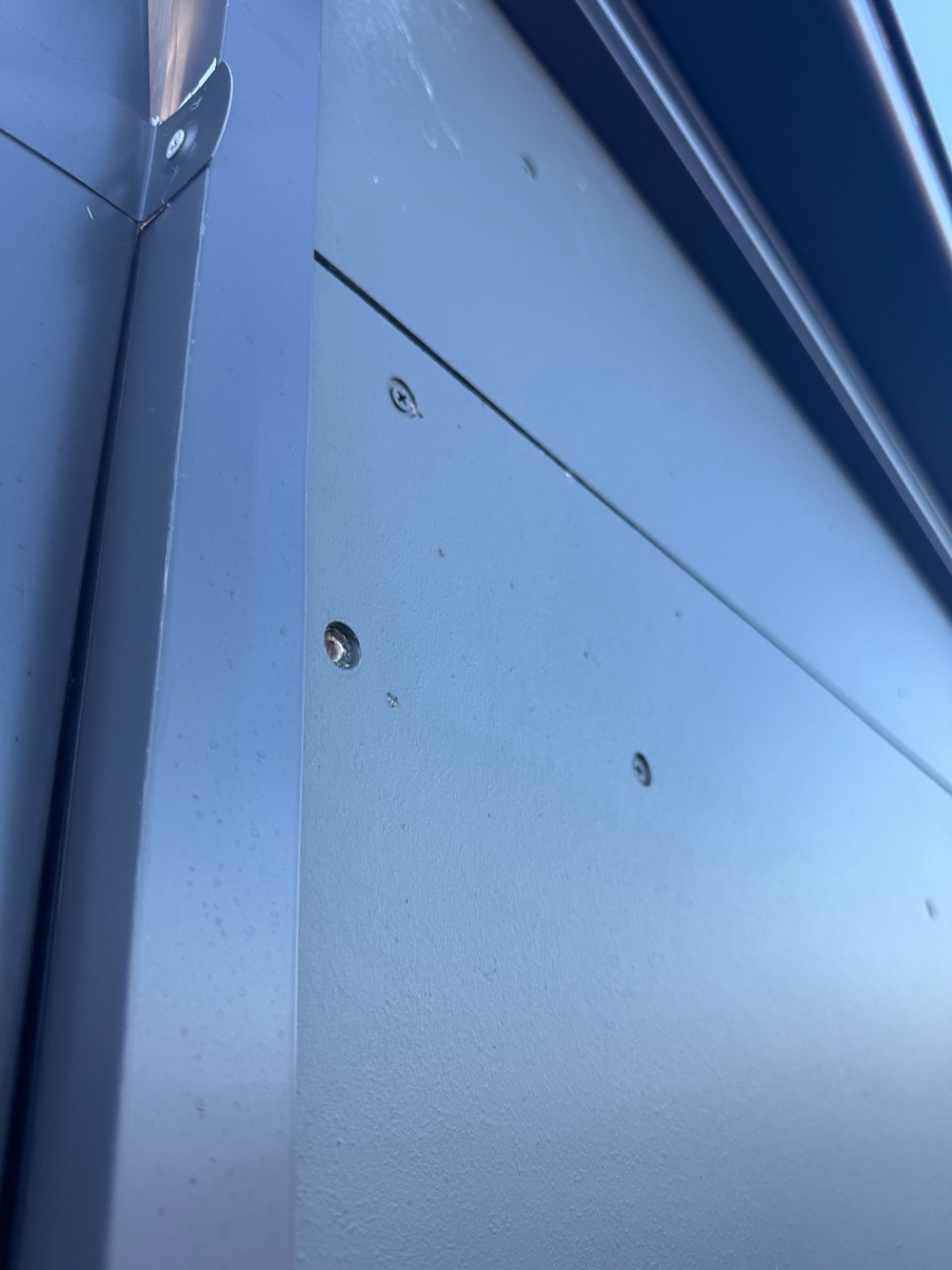 Cladding finish at a boundary wall, Pakenham East